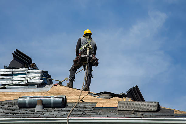 Professional Roofing technician working in Tallman, NY